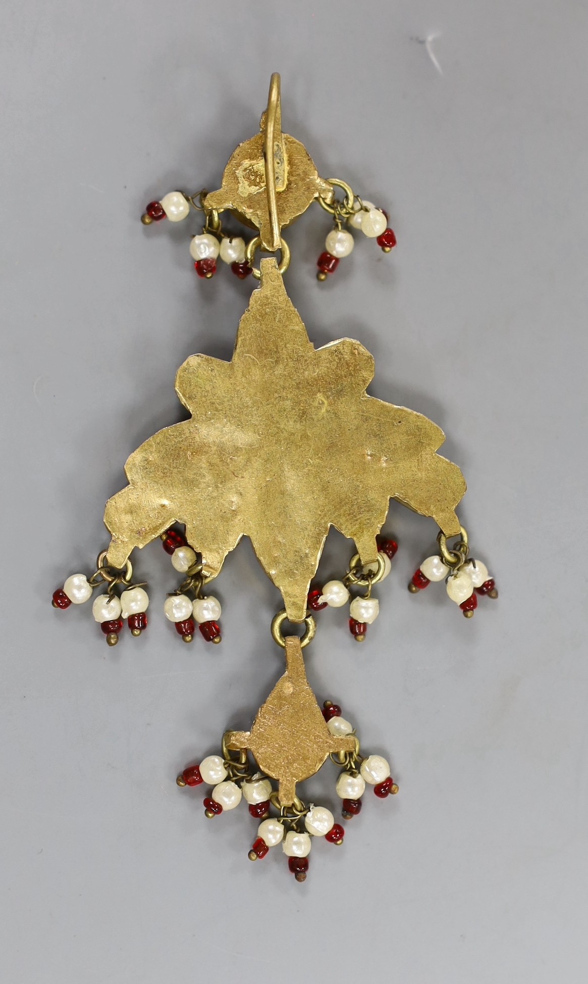 A gilt metal and bloodstone set fob seal, 30mm and a gilt metal, red paste and simulated seed pearl set drop pendant.